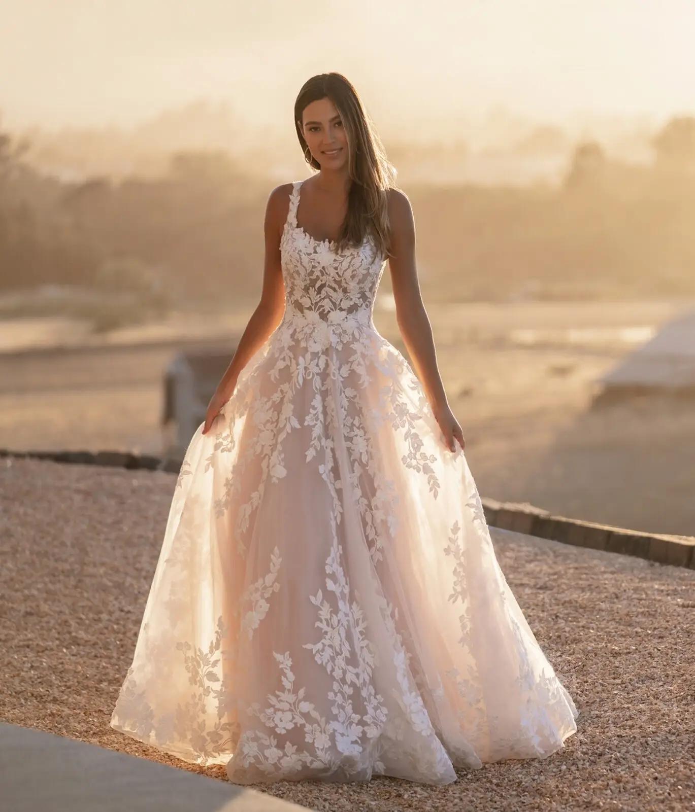 Model wearing a gown by Allure Bridals