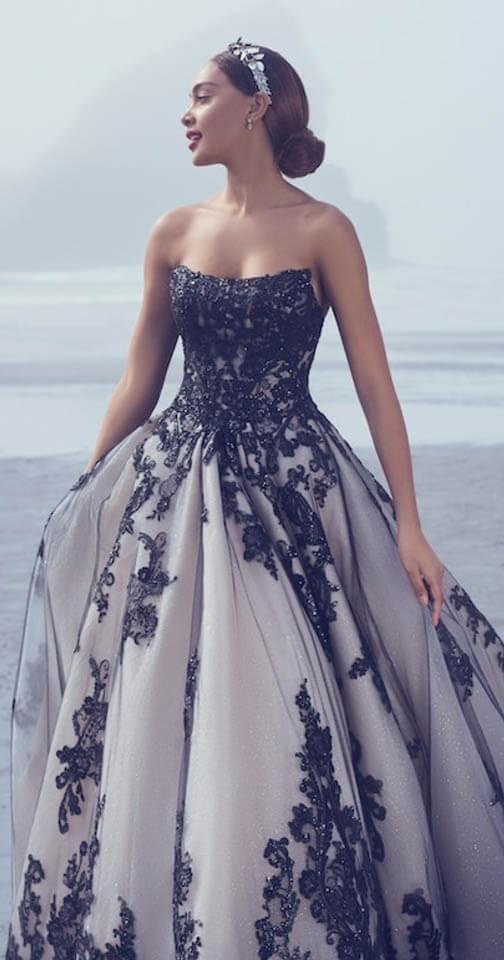 Model wearing a black and white gown